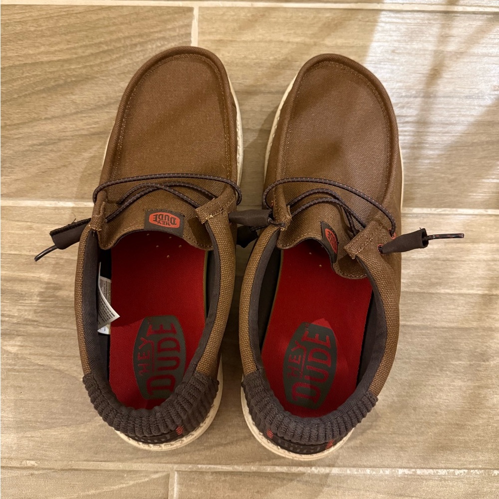 Hey Dude Chocolate Brown Slip-Ons with Red Accents